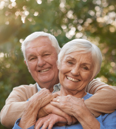 content senior couple smiling happily outdoors together