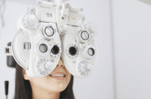 Asian Woman doing eye test in clinic