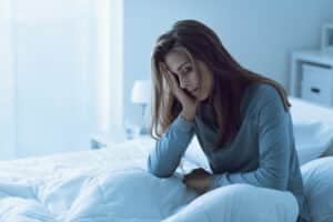 Depressed woman awake in the night