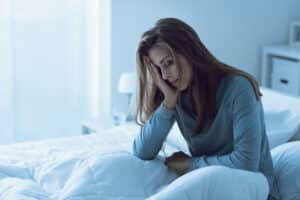 Depressed woman awake in the night