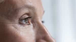 A close-up shot of a senior woman’s eyes