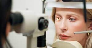 Woman having an eye exam for a retinal tear in Loveland, CO