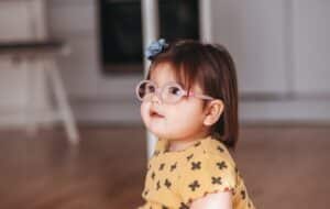 Little girl wearing glasses in Loveland, CO